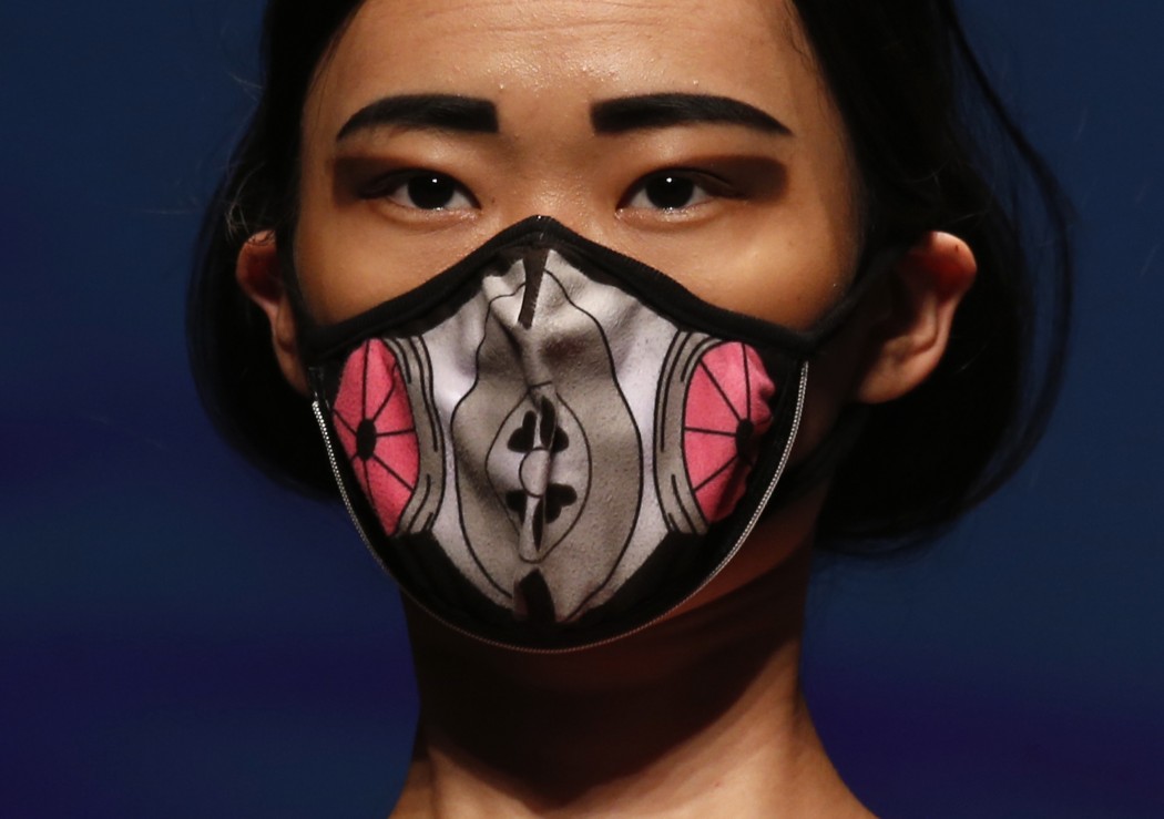 A model presents a creation by designer Griffee at the Hong Kong Fashion Week for Spring and Summer 2015, in Hong Kong